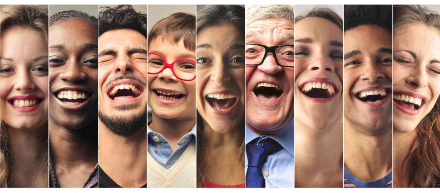 Thin slices of nine different smiling faces of many ages and ethnicities.