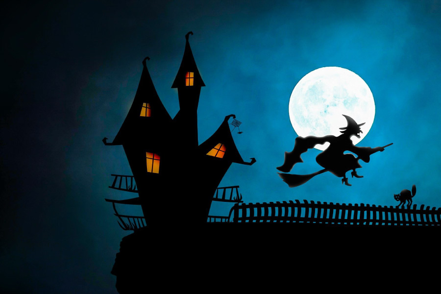 Graphic of a Halloween house with a witch on her broomstick flying in front of the moon.
